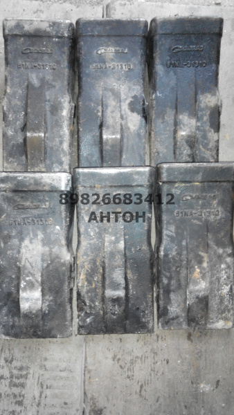 zub-kovsha-hyundai-61na-31310